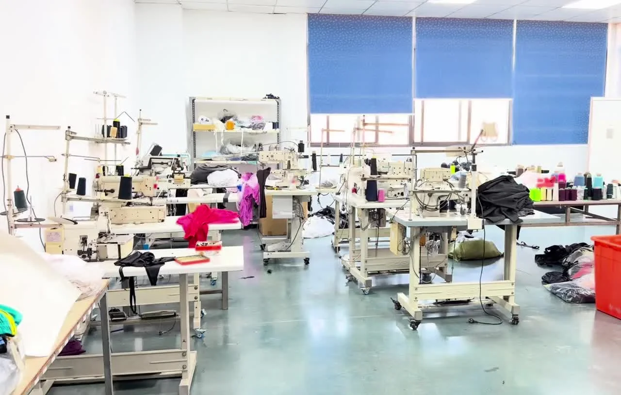 Sewing workstations, garment components and work aisles in the factory