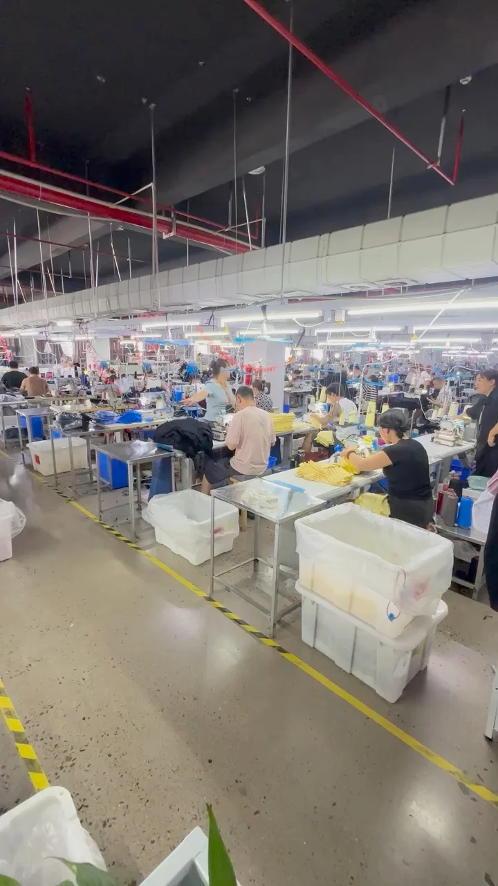 Rows of garment workstations on a production floor