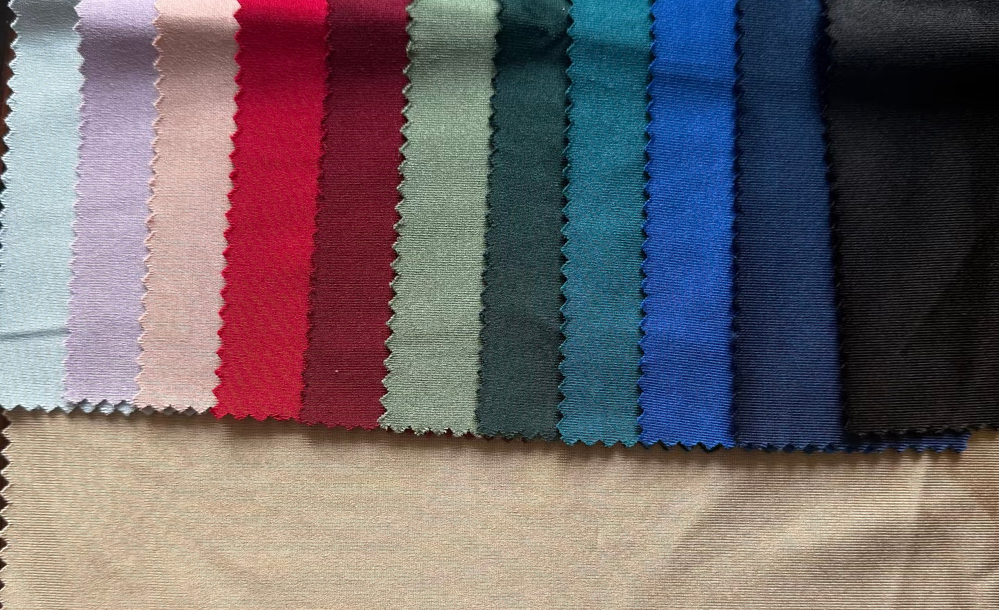 Physical color swatches used to compare fabric directions